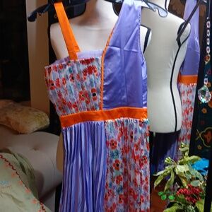 Nwt!! Beautiful size 0 to 2. Purple and orange white 💜 summer dress lined.